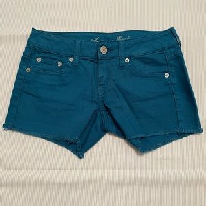 2 for $10 American Eagle midi shorts. Blue are a size 0 and the pink are 00